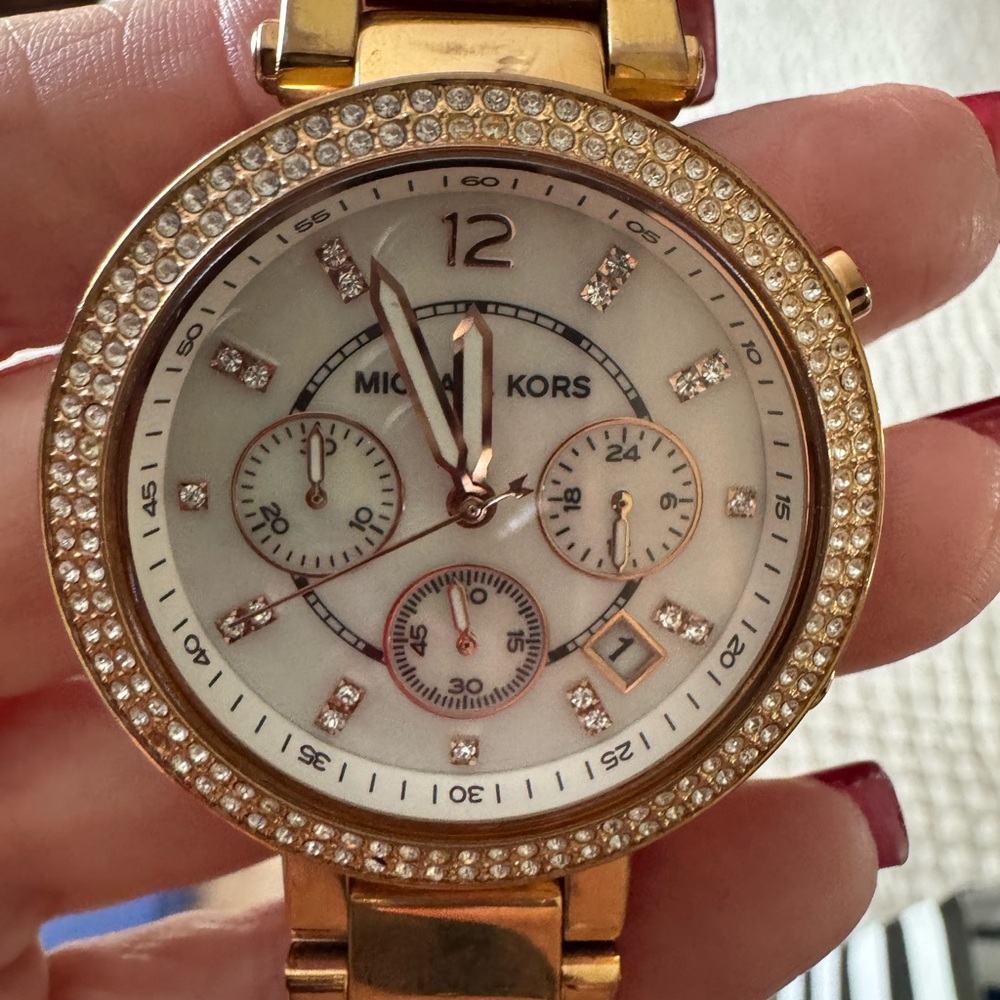 Michael Kors Gold Parker Watch. Minimal wear. Needs a battery.